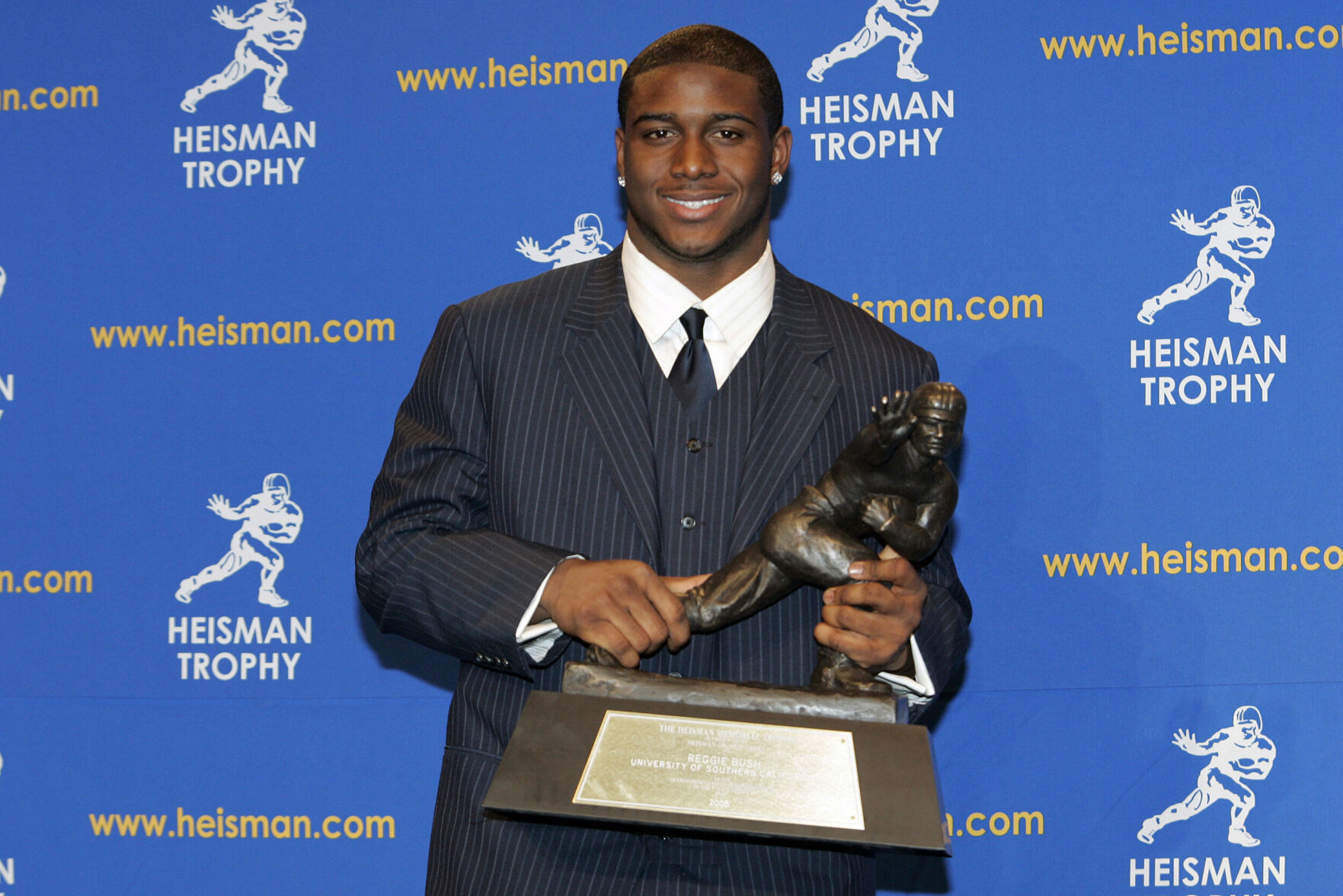 NCAA stance means Reggie Bush won't get Heisman Trophy back